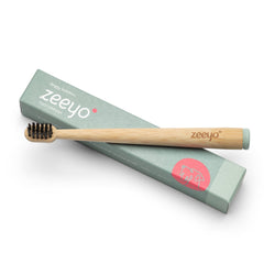 Zeeyo bamboo dog toothbrush with laser-etched logo and eco-friendly packaging for high-end dental care